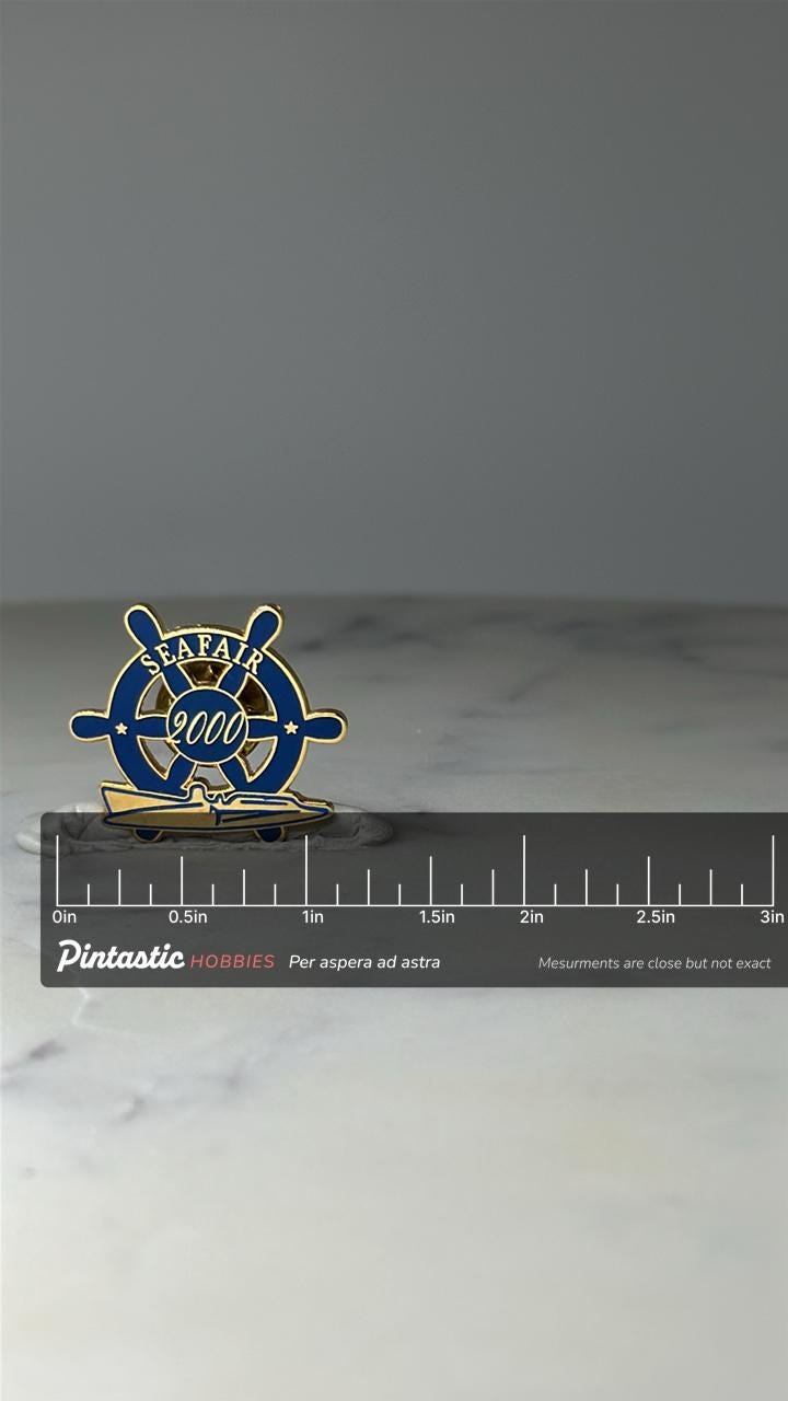 Vintage Seafair 2000 Lapel Pin: Blue Gold Enamel - Seattle Event Accessory with ruler overlay for size reference