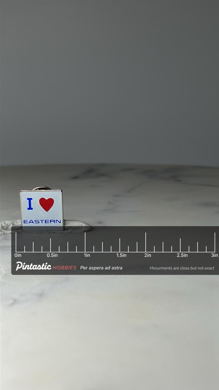 Vintage I Love Eastern Airline Lapel Pin: White Enamel - Airline Souvenir Accessory with ruler overlay for size reference