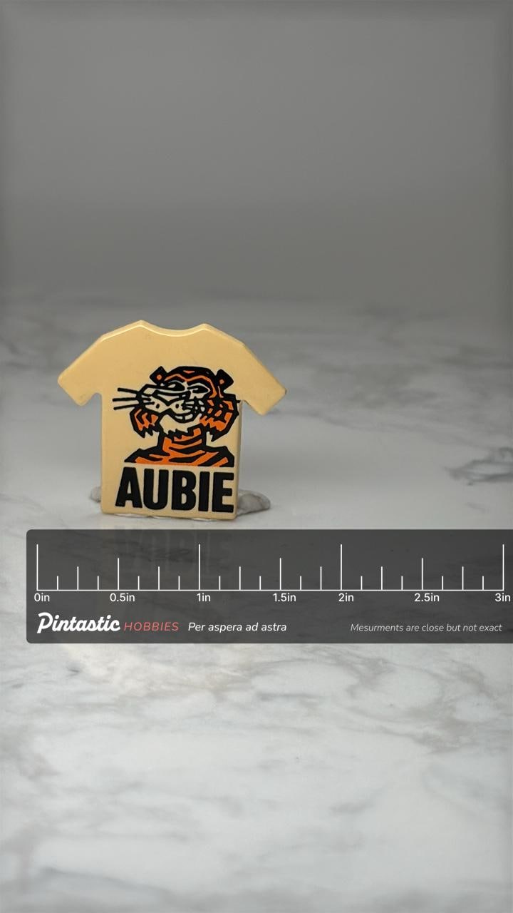 Vintage Auburn Tigers T-Shirt Pin: Yellow Enamel - College Mascot Accessory with ruler overlay for size reference