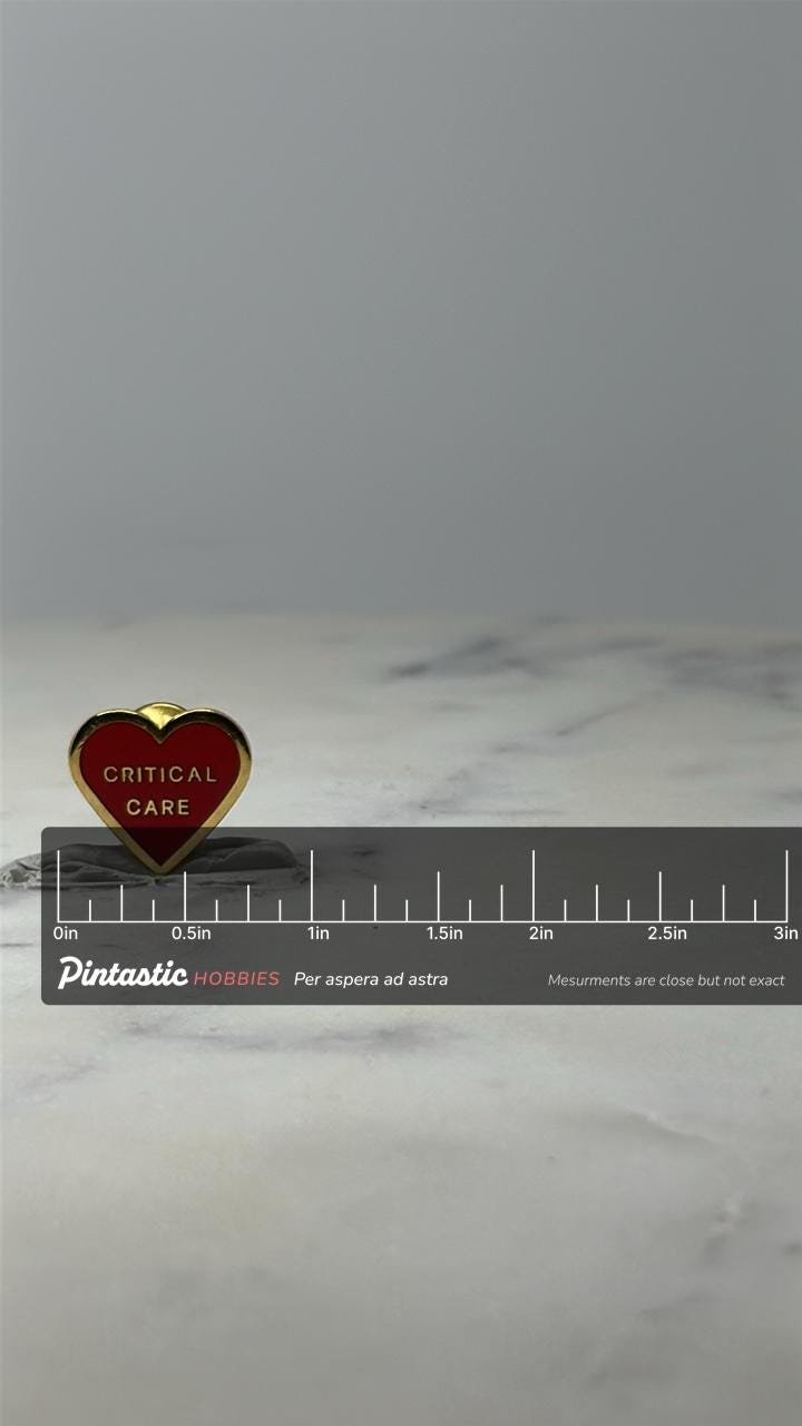 Critical Care Heart Enamel Pin: Red & Gold - Medical Accessory with ruler overlay for size reference