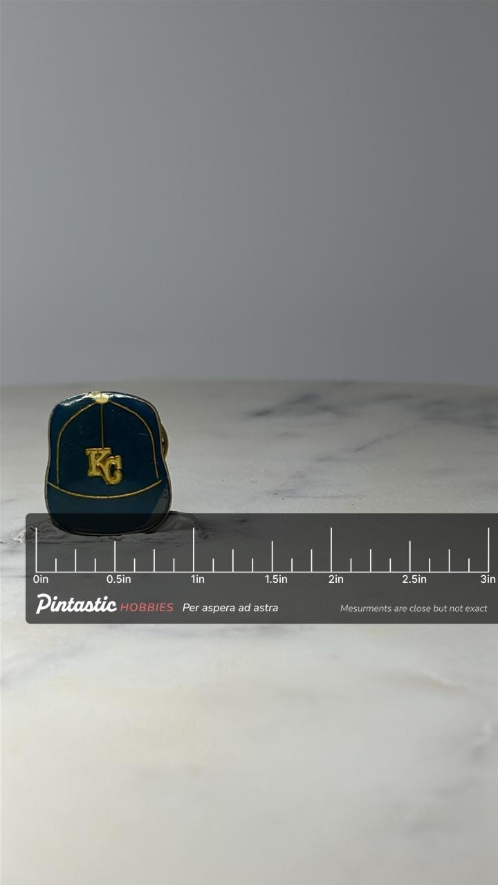 Vintage Kansas City Royals Hat Pin: Blue & Gold Enamel - MLB Sports Accessory with ruler overlay for size reference