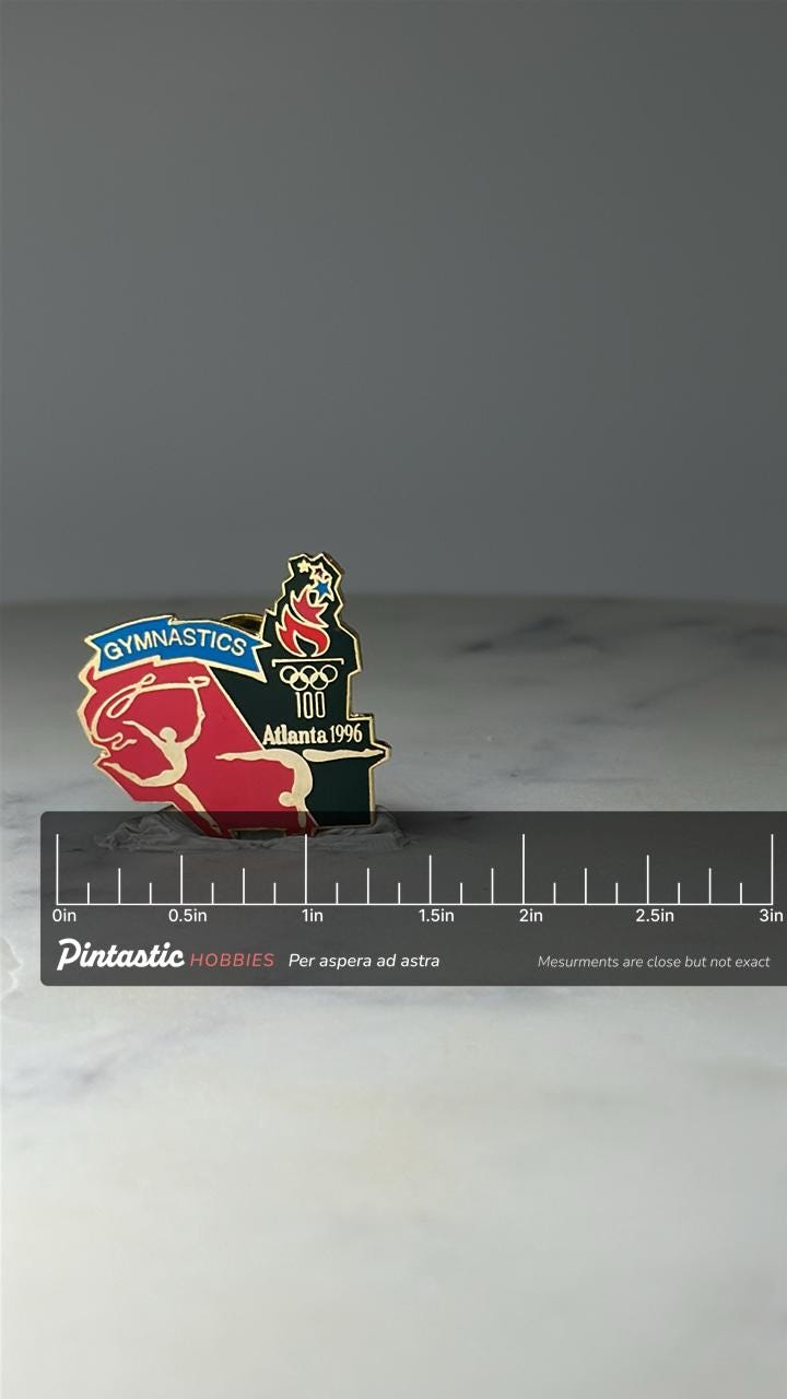 Vintage Gymnastics Olympic Pin: Red & Gold Enamel - Atlanta 1996 Accessory with ruler overlay for size reference