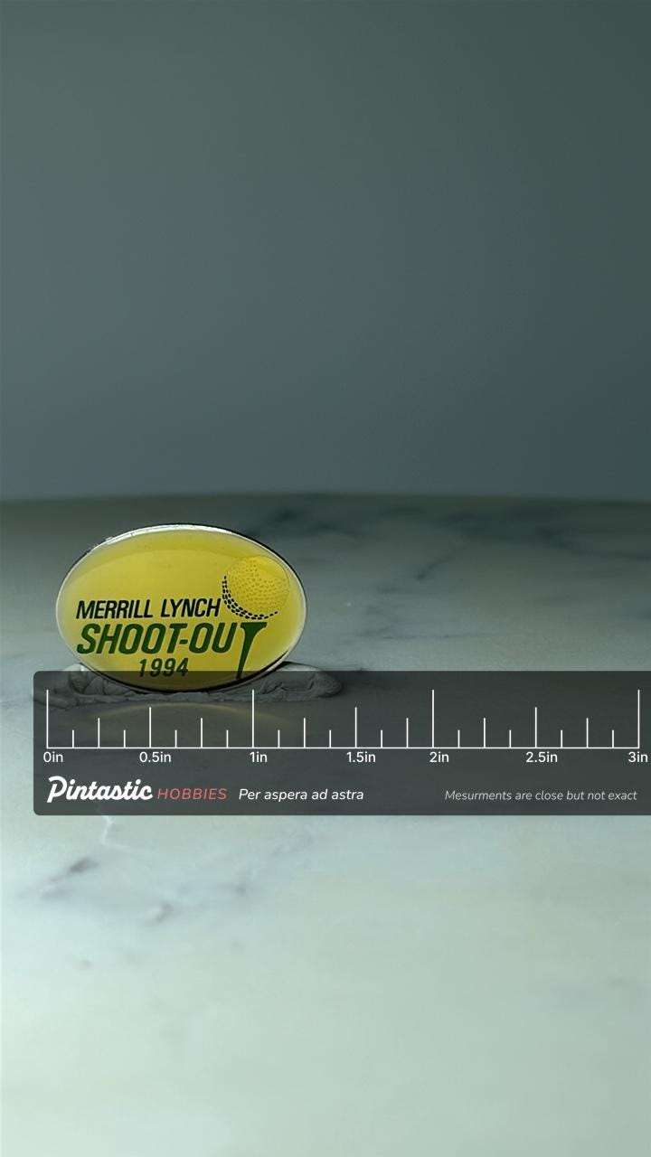 Vintage Merrill Lynch Shoot-Out Golf Pin: Yellow Enamel - 1994 Tournament Accessory with ruler overlay for size reference
