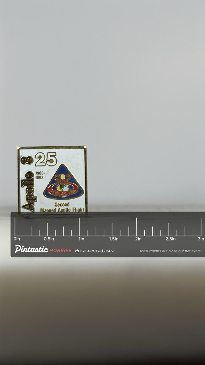 Apollo 8 25th anniversary pin: gold enamel badge - space history accessory with ruler overlay for size reference