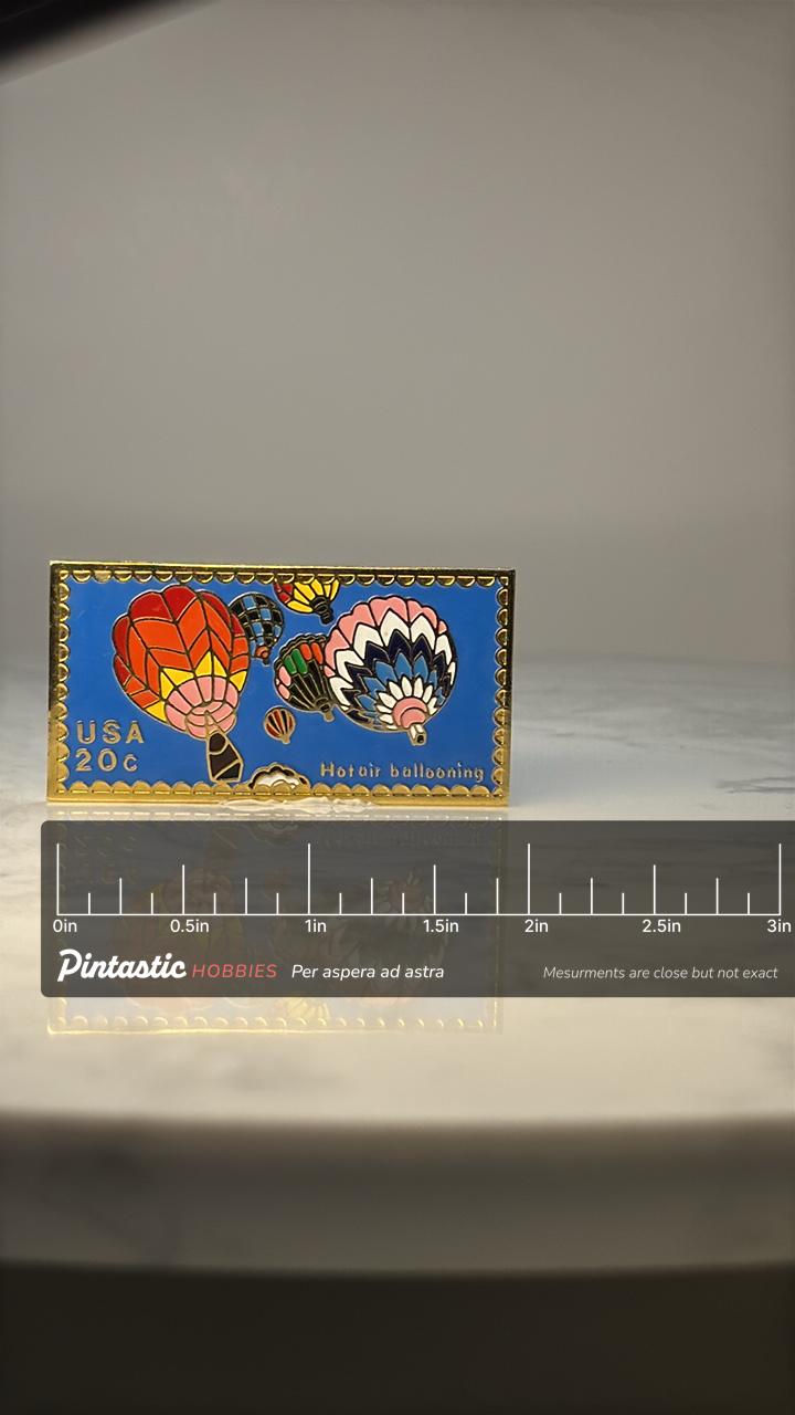 Vintage USA Hot Air Balloon Stamp Pin: Gold Tone Enamel - 1980s Souvenir Accessory with ruler overlay for size reference