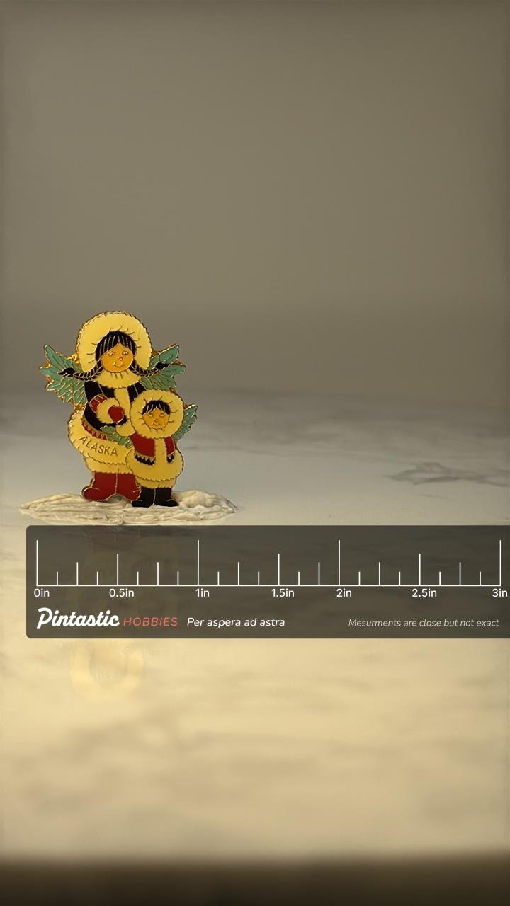 Vintage Alaska Eskimo Angel Lapel Pin: Enamel Gold Tone - Souvenir Accessory with ruler overlay for size reference