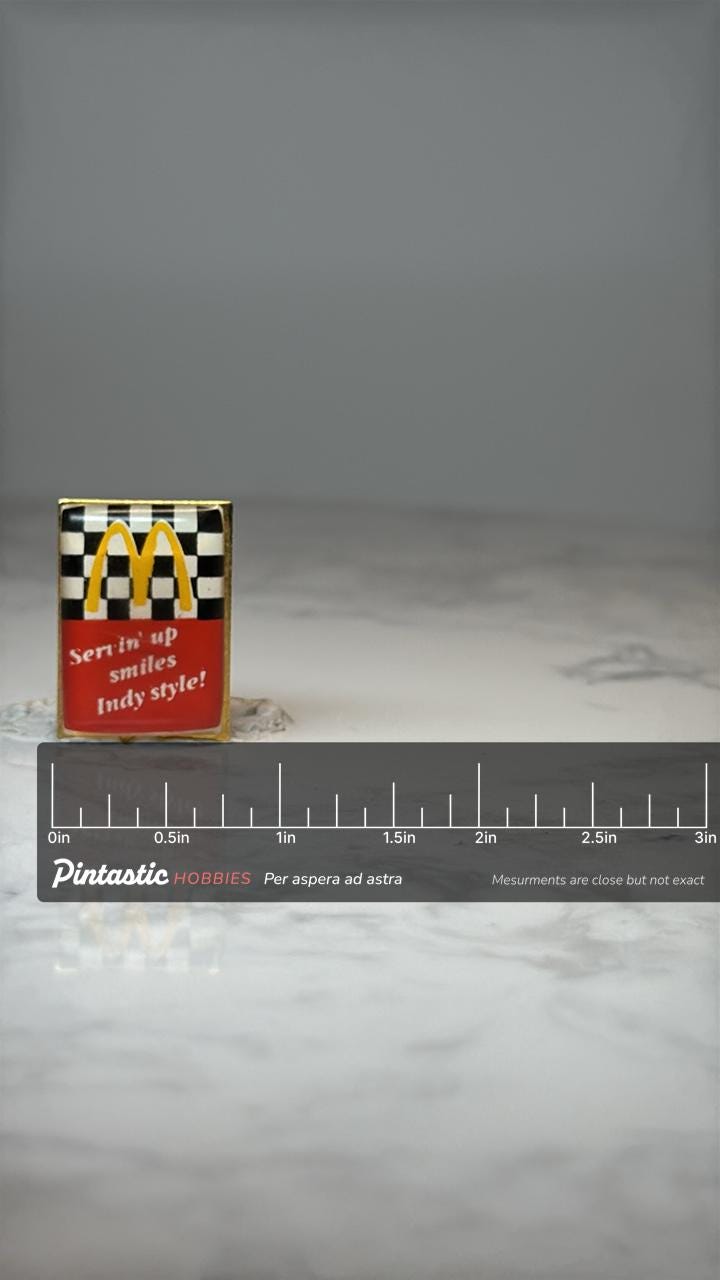 Vintage McDonalds Advertising Lapel Pin: Gold Enamel - Indy Style Promo with ruler overlay for size reference