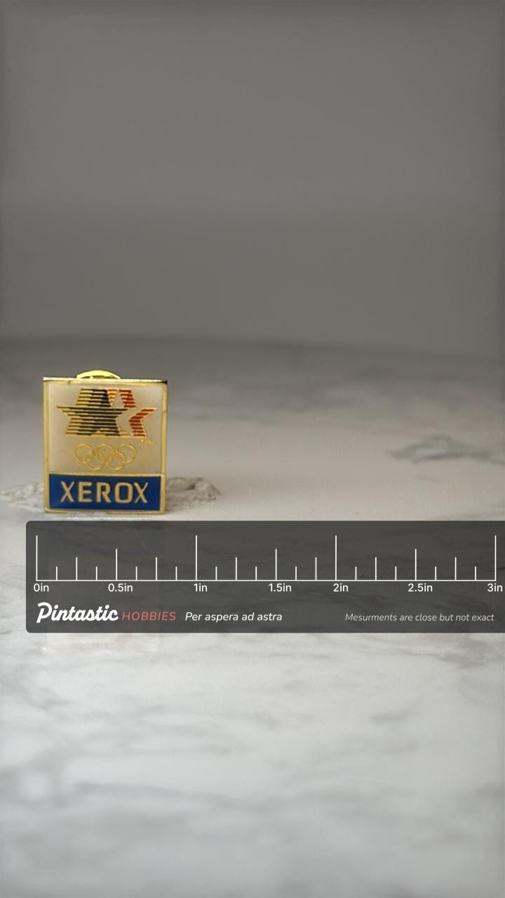 Vintage Xerox Olympic Sponsor Lapel Pin: Gold Enamel - 1980s Corporate Accessory with ruler overlay for size reference