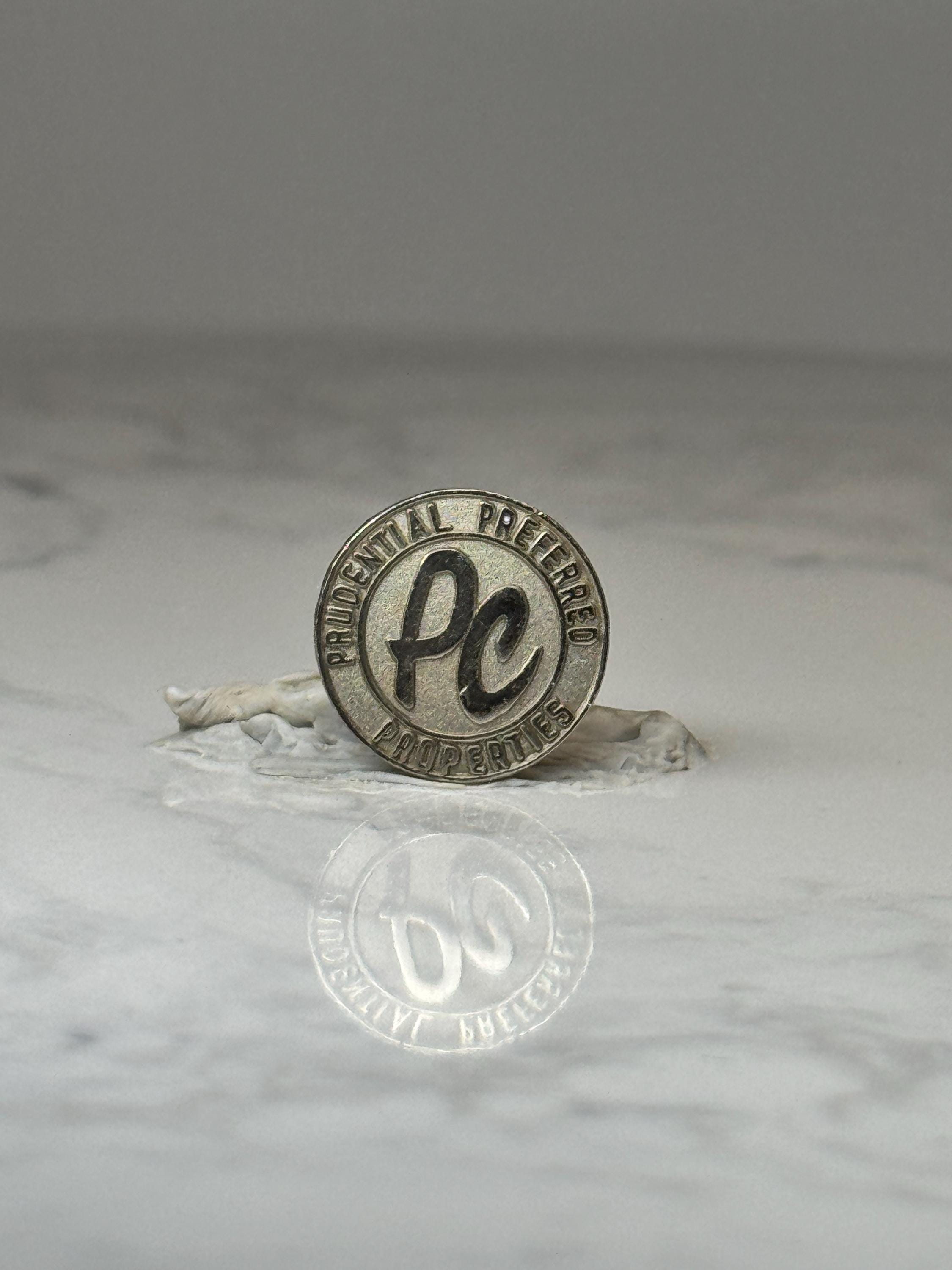 Vintage Prudential Properties Pin: Silver Tone - 1990s Corporate Accessory