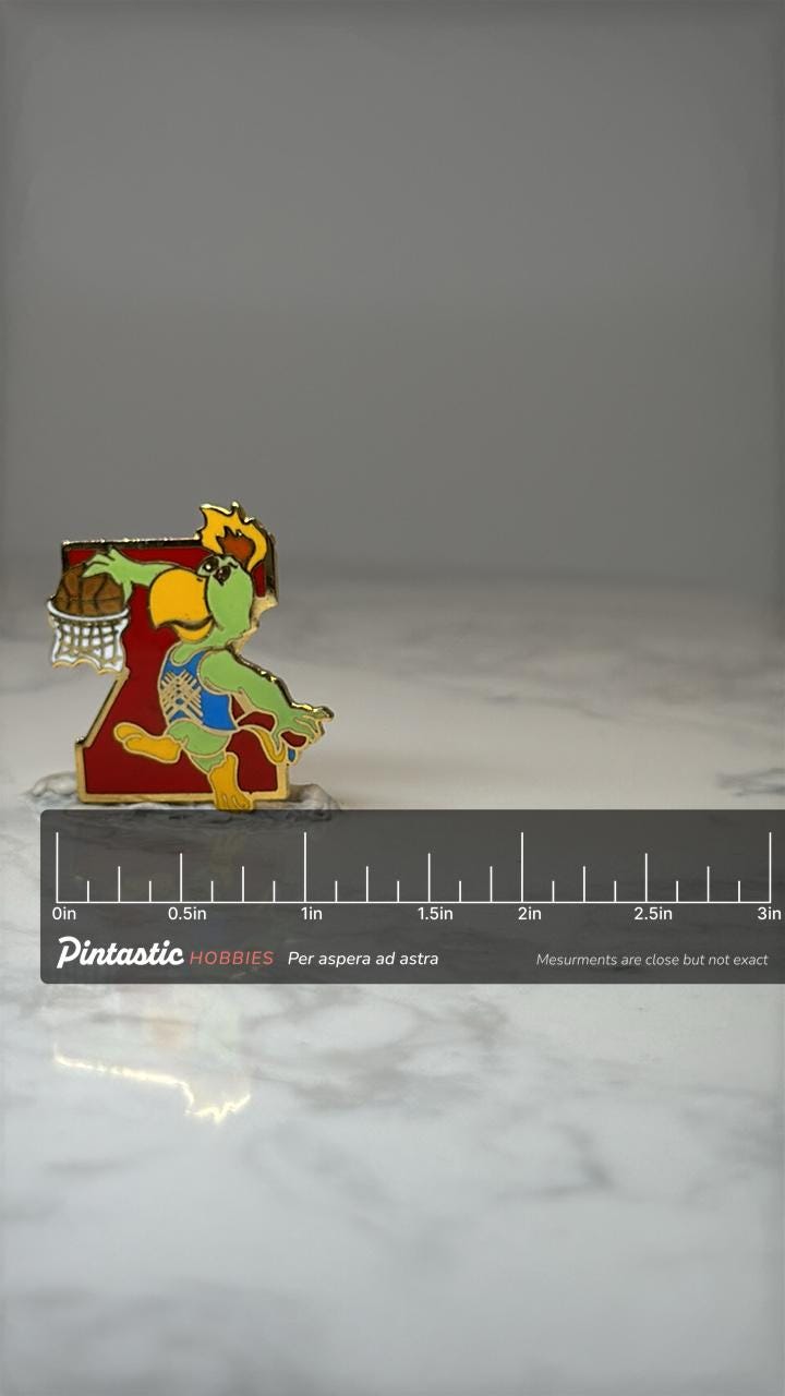 Vintage 1985 Pan American Games Pin: Amigo Parrot Basketball Mascot with ruler overlay for size reference