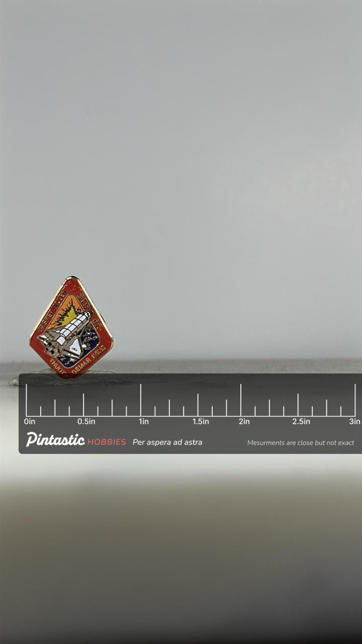 Nasa sts-62 shuttle mission pin: red enamel diamond - 1990s space accessory with ruler overlay for size reference