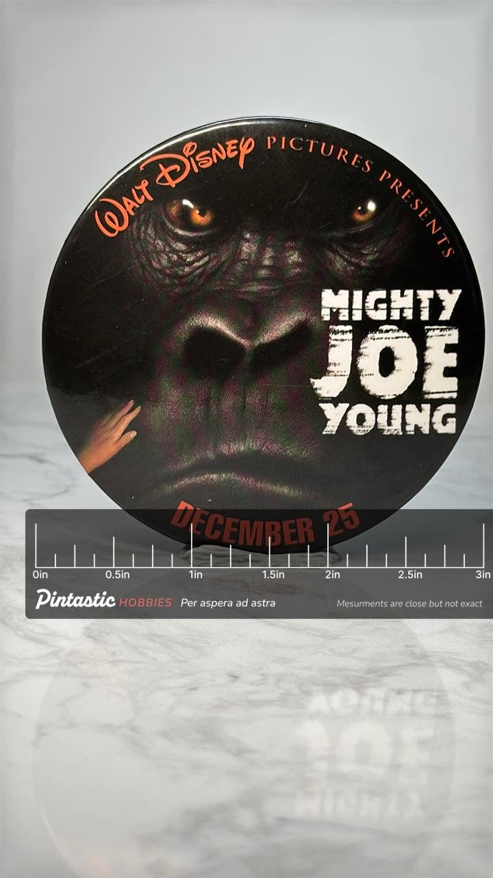 Vintage Mighty Joe Young Movie Pin: Black Promo Button - 1998 Disney Film Accessory with ruler overlay for size reference