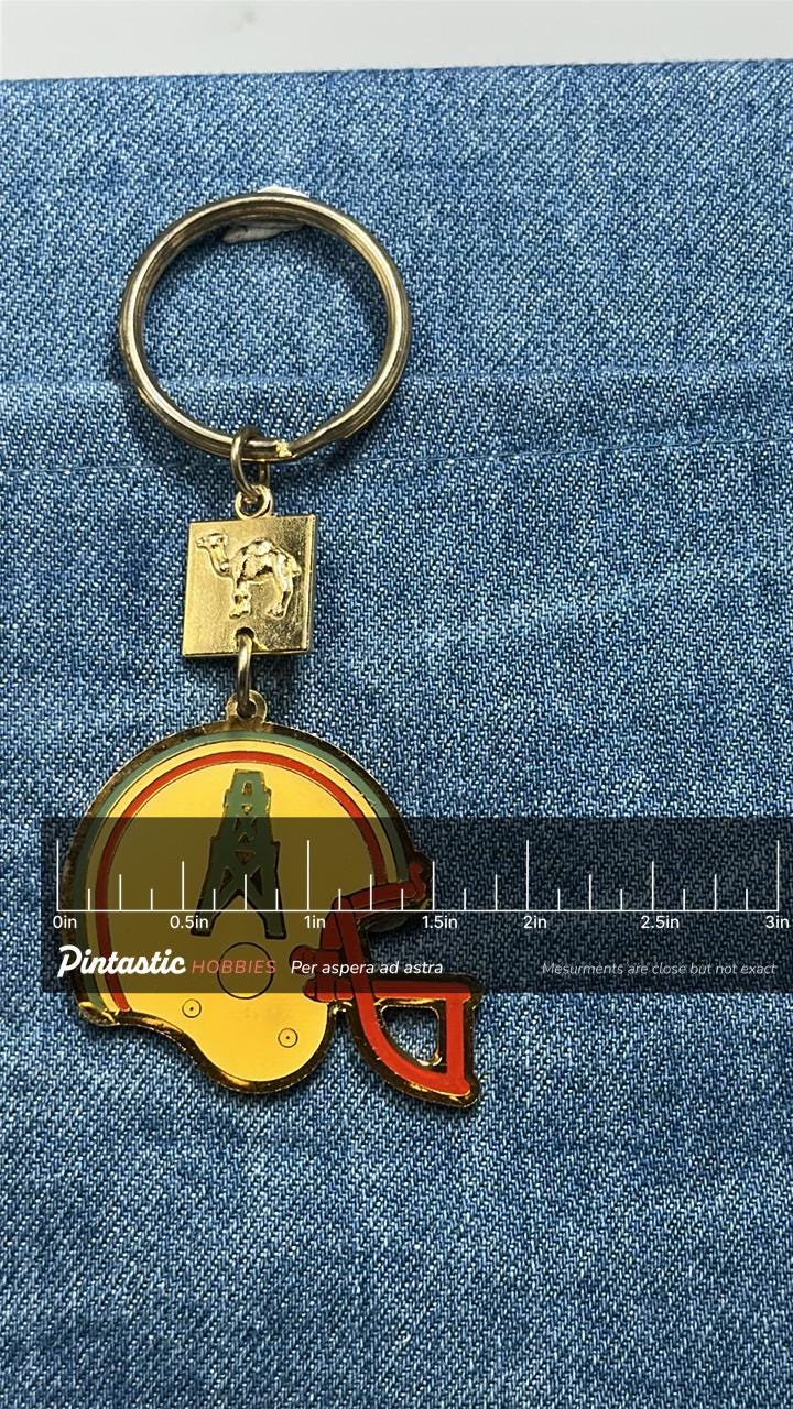 Houston Oilers Helmet Keychain: Vintage Camel Cigarettes Promo Football Key Ring with ruler overlay for size reference