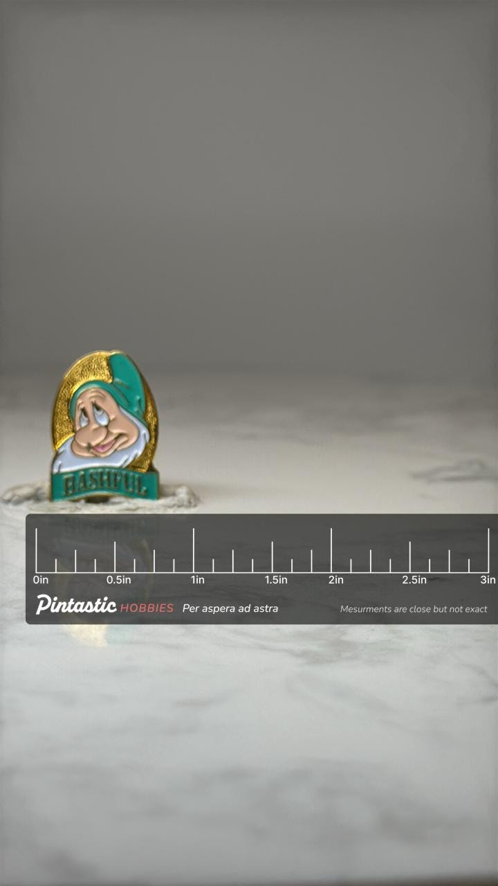 Vintage Disney Bashful Enamel Pin: Gold Tone-1990s Character Accessory with ruler overlay for size reference