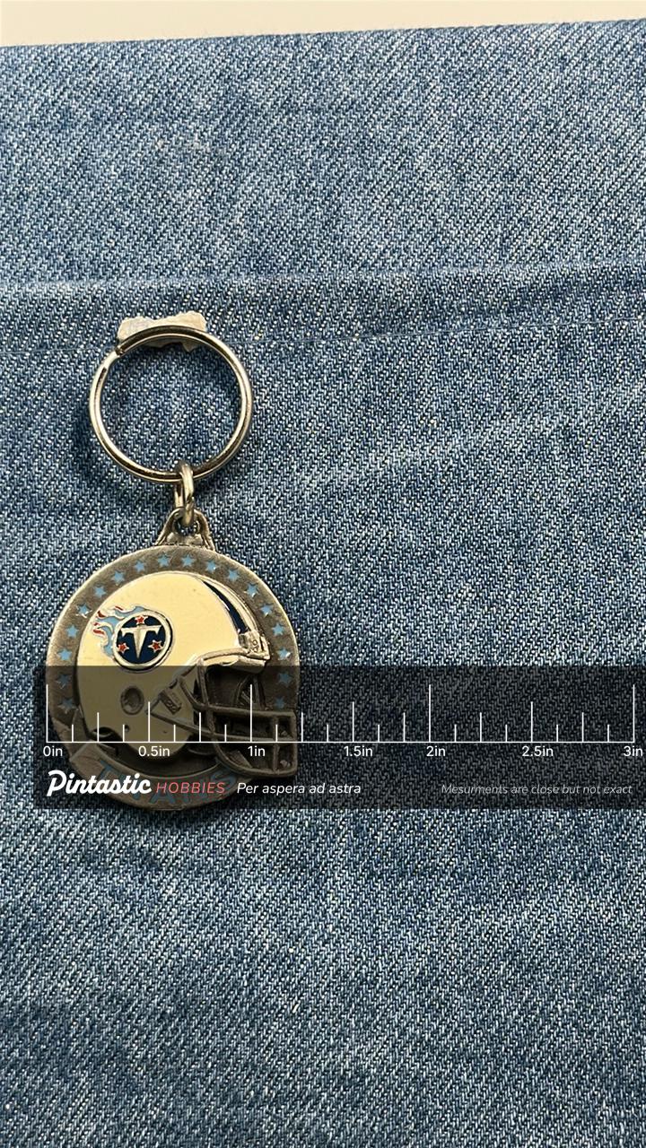 Vintage Tennessee Titans Keychain: Metal Enamel - NFL Football Accessory with ruler overlay for size reference