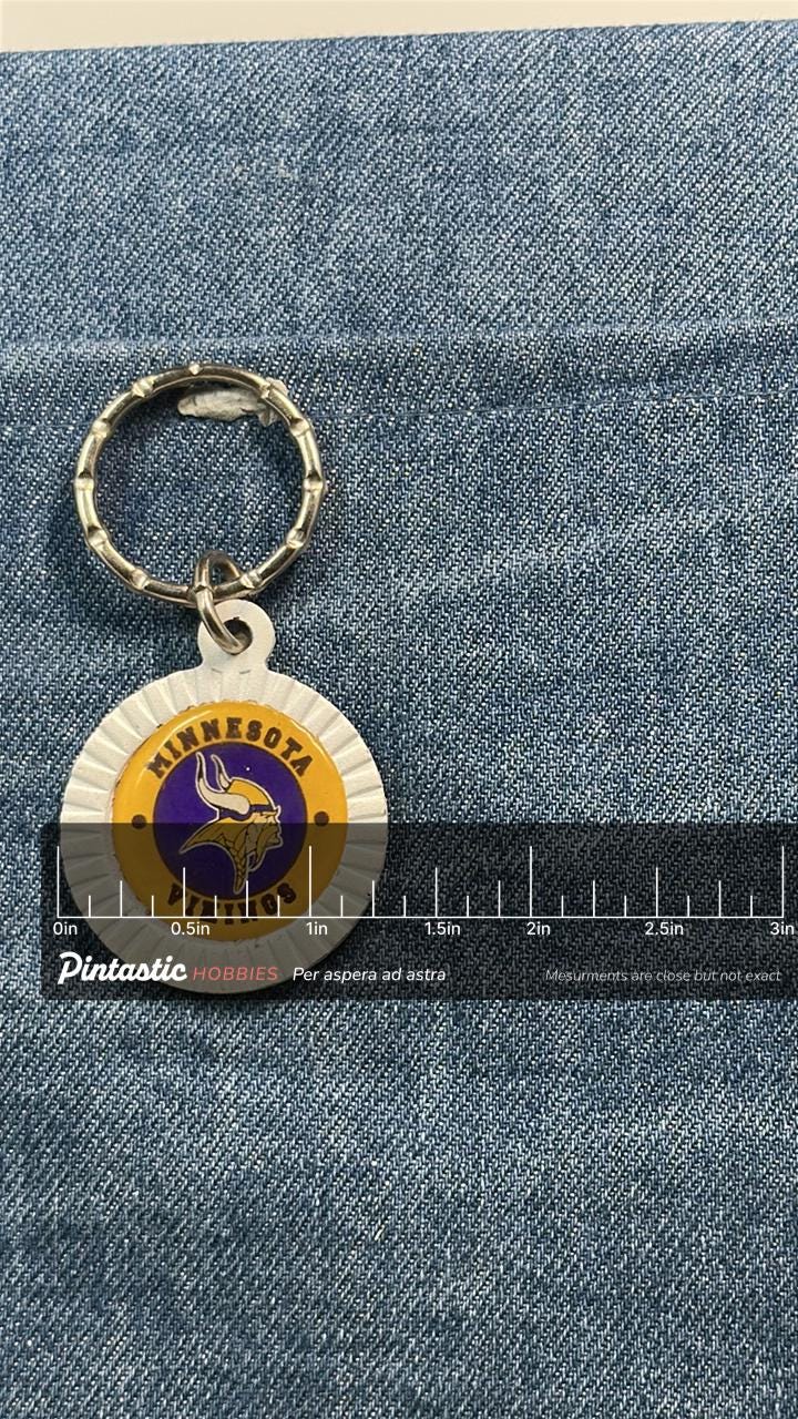 Vintage Minnesota Vikings Keychain: Plastic Enamel - NFL Sports Accessory with ruler overlay for size reference