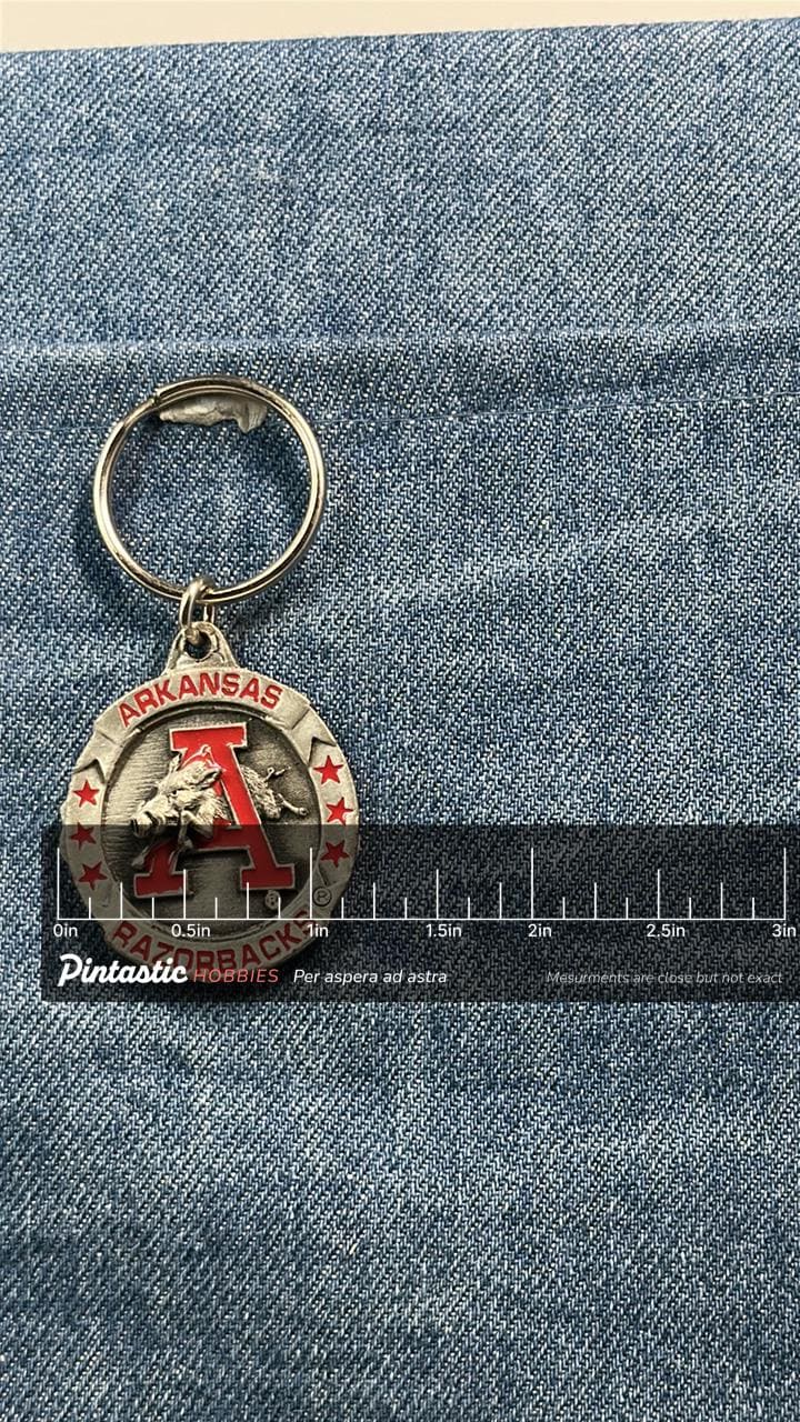 Vintage Arkansas Razorbacks Keychain: Metal Enamel - NCAA College Accessory with ruler overlay for size reference