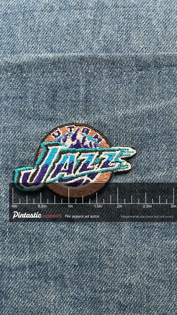 Utah Jazz NBA Patch: Purple Teal Logo - 1990s Sports Accessory with ruler overlay for size reference