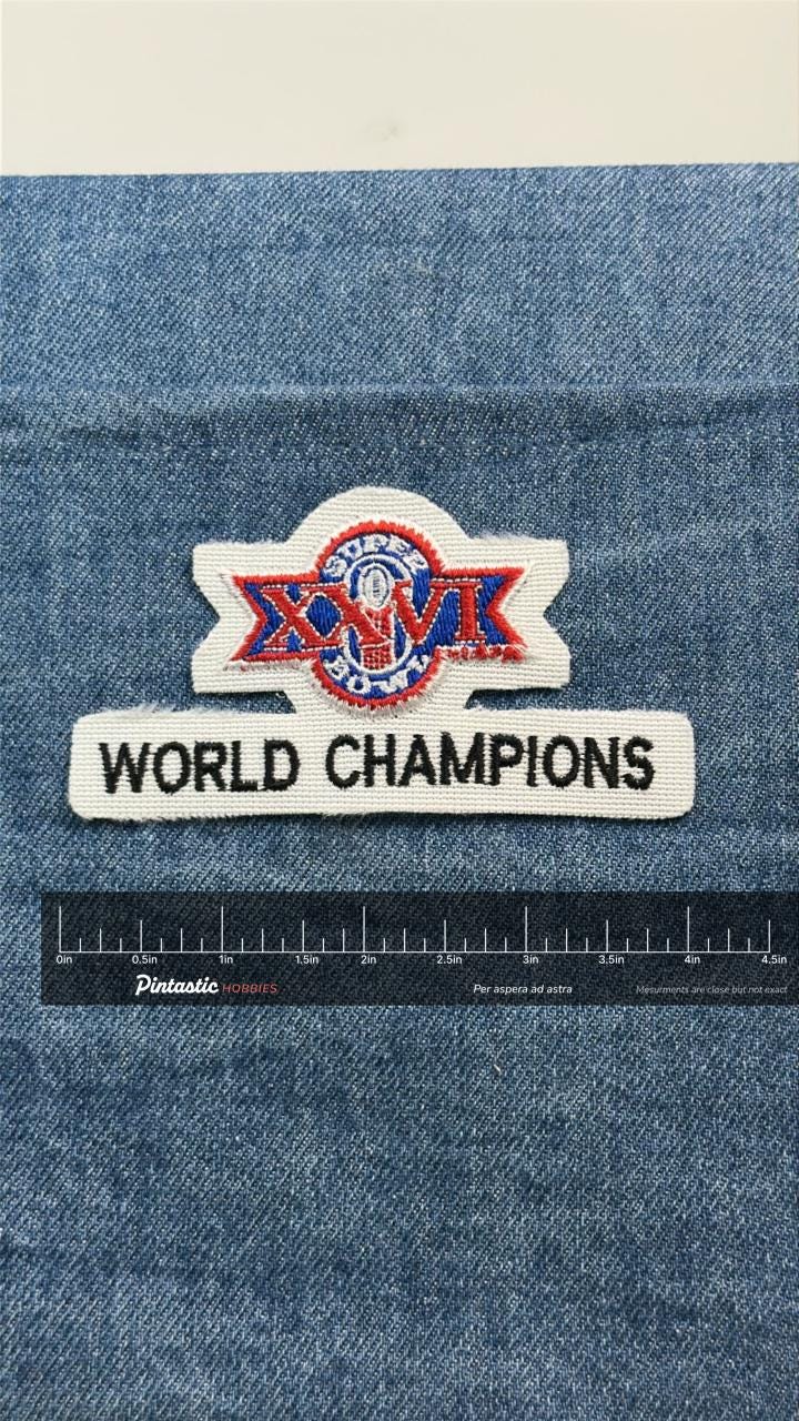Super Bowl XXVI Patch: Red White Blue - NFL World Champions with ruler overlay for size reference