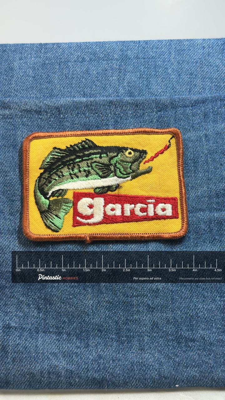 Garcia Fishing Patch: Yellow Bordered - Vintage Tackle Accessory with ruler overlay for size reference