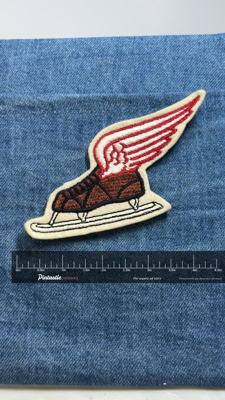 Winged Ice Skate Patch Vintage Hockey Style Embroidered Patch with ruler overlay for size reference