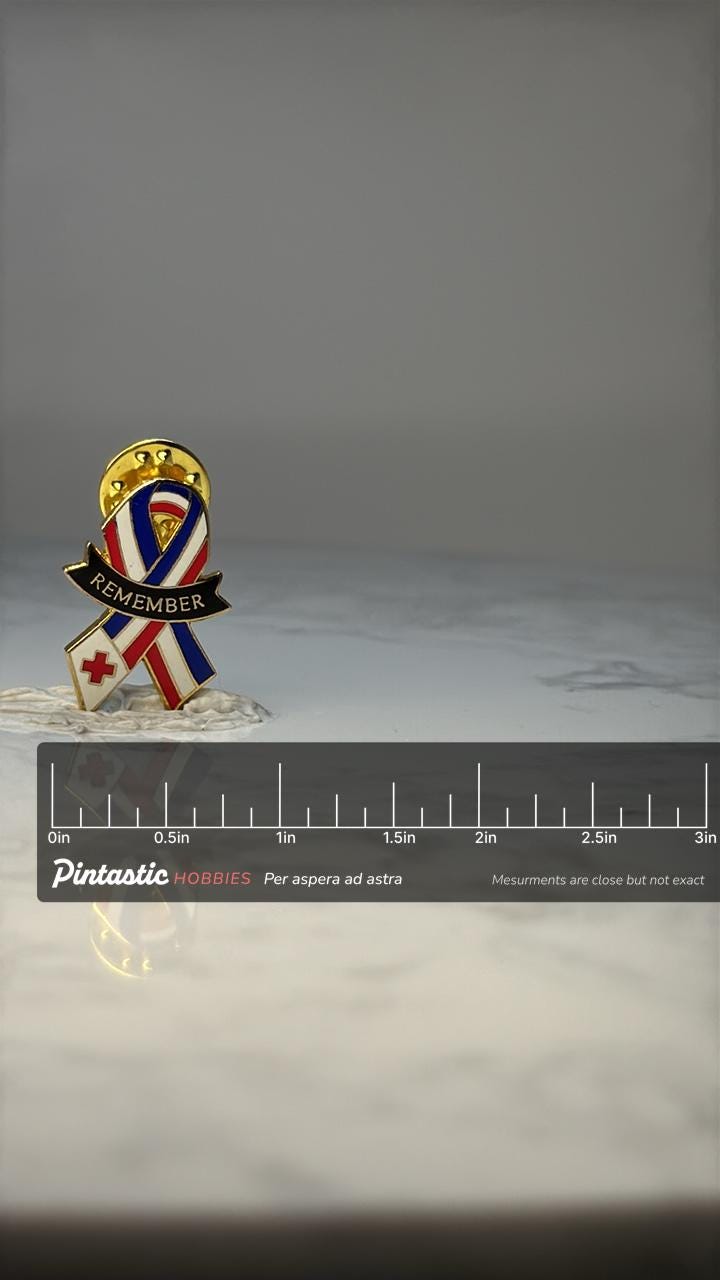 Vintage Red Cross Remember Ribbon Lapel Pin: Enamel Gold Tone - Patriotic Accessory with ruler overlay for size reference