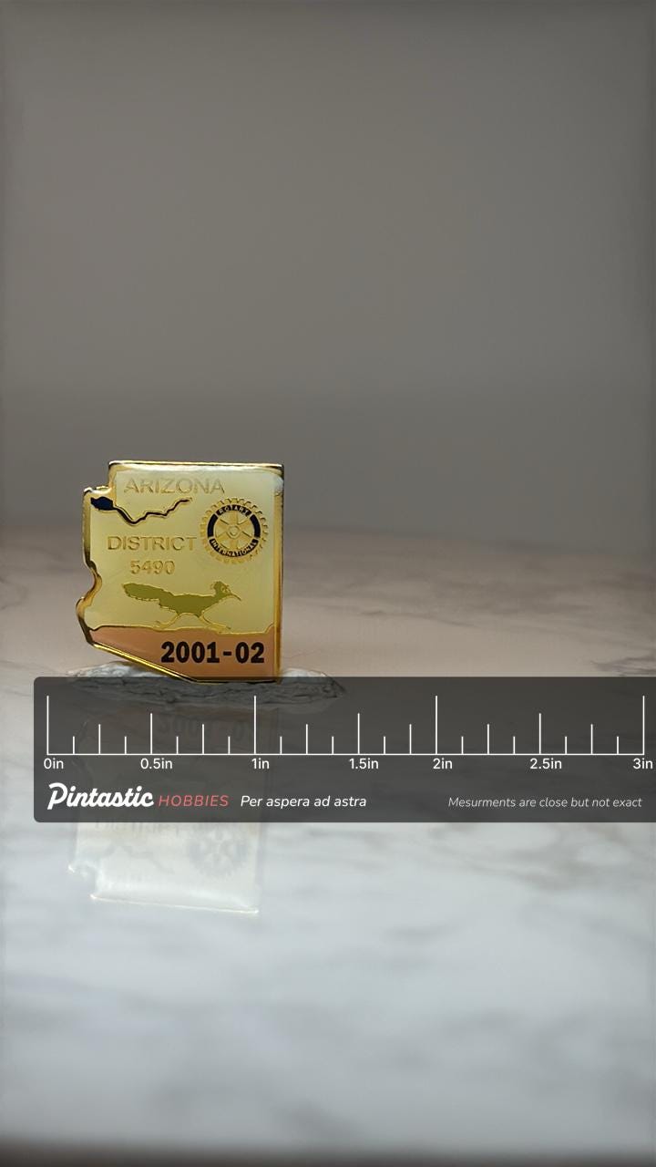 Vintage Arizona District 5490 Lapel Pin: Gold Tone - 2001 02 Rotary International with ruler overlay for size reference