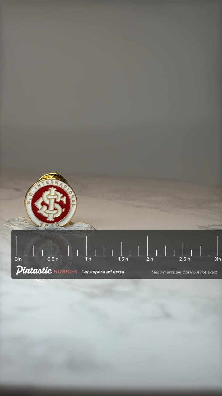 Vintage S.C. Internacional Pin: Red White Gold - 1909 Football with ruler overlay for size reference