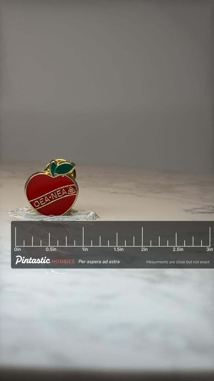 Vintage OEA NEA Apple Lapel Pin: Red Enamel Gold Tone - School Accessory with ruler overlay for size reference