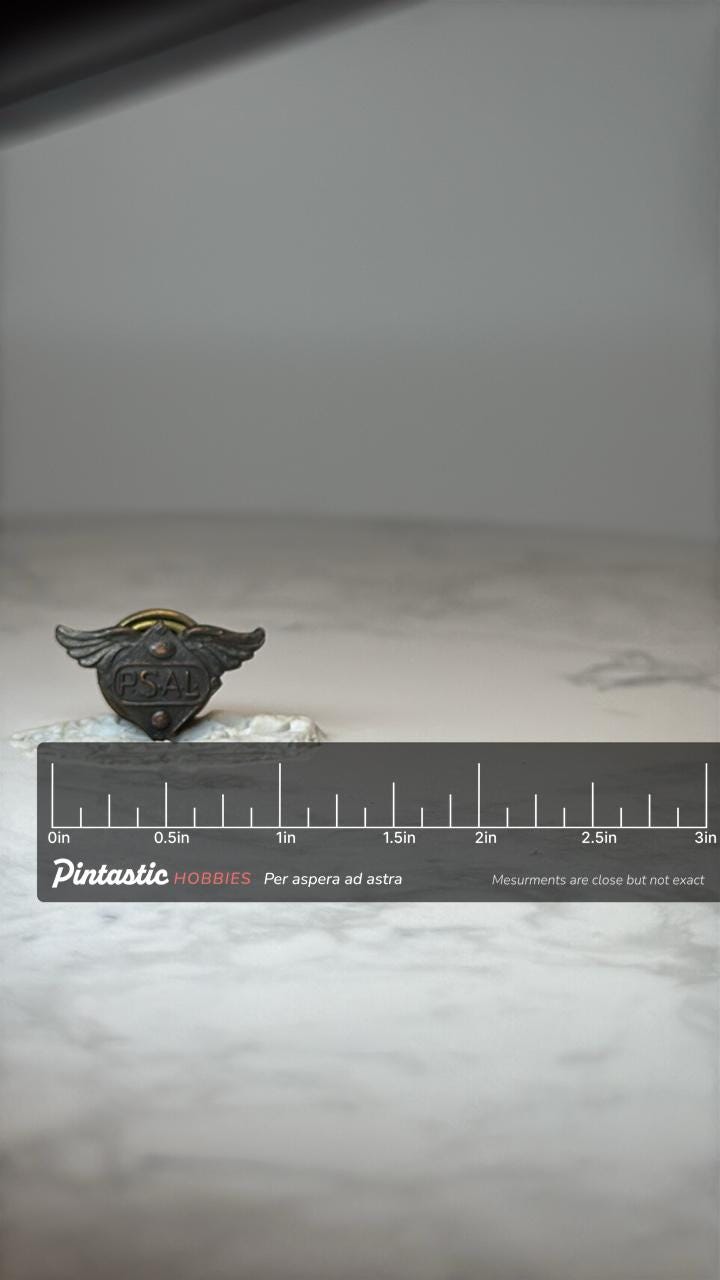 Vintage PSAL Athletic Pin: Winged Bronze Tone - School Sports Award with ruler overlay for size reference