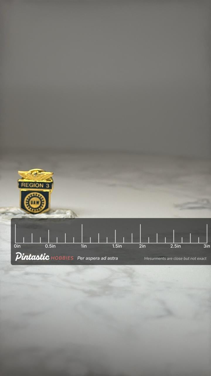 Vintage UAW Region 3 Enamel Lapel Pin: Gold Tone & Blue - Union Accessory with ruler overlay for size reference