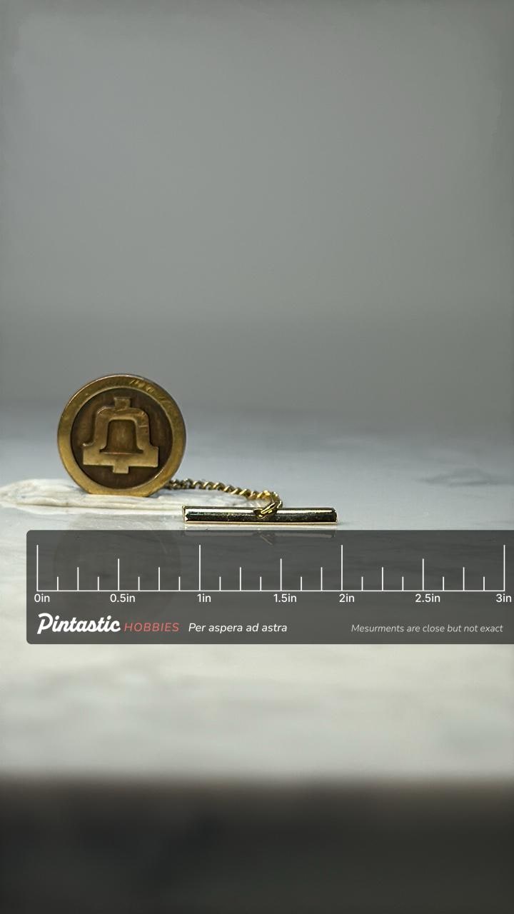 Bell System Tie Tack Vintage Bell Telephone Logo Lapel Pin Gold Tone Telecom Chain Tack with ruler overlay for size reference