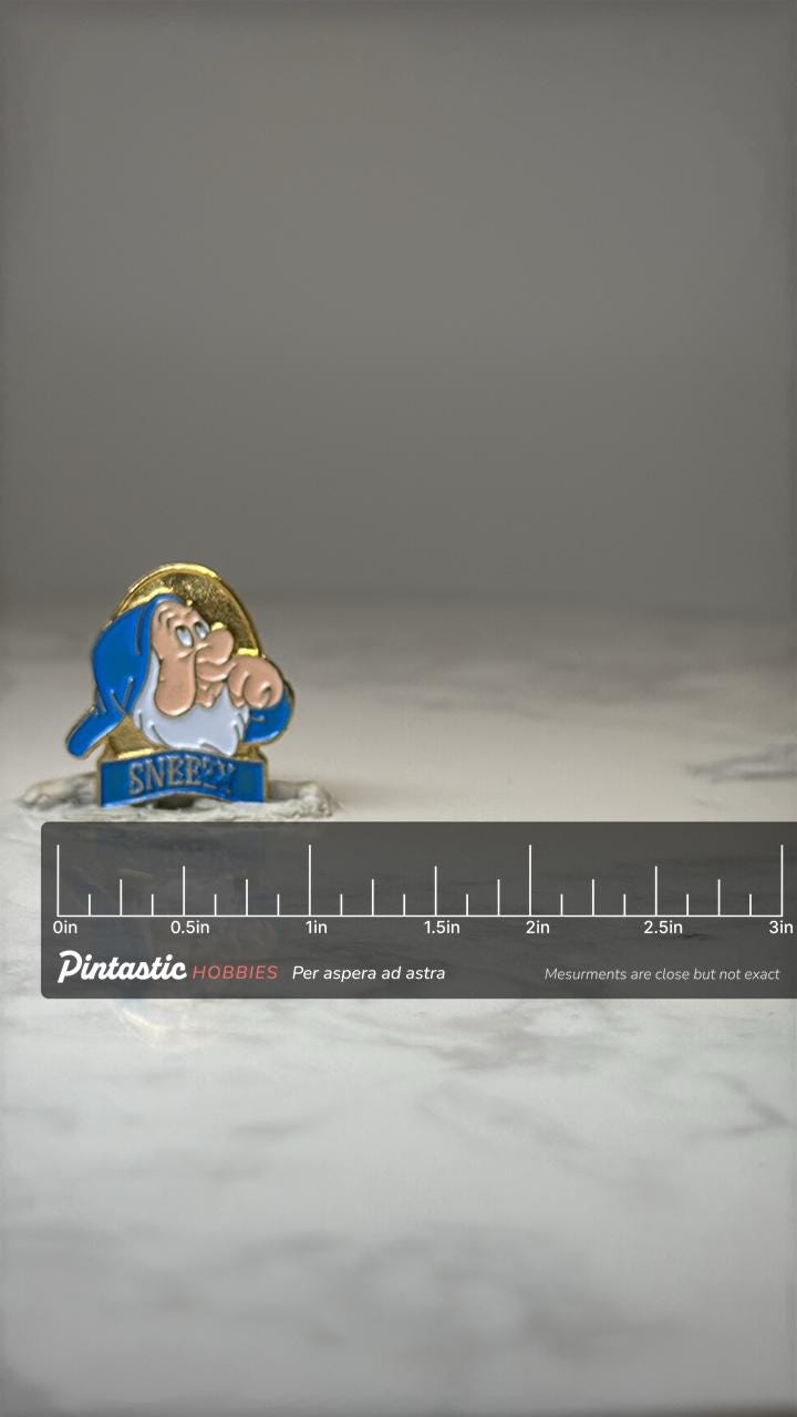 Vintage Disney Sneezy Character Pin: Blue Enamel - Snow White Accessory with ruler overlay for size reference