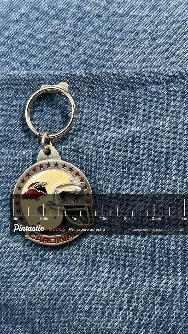 Vintage Arizona Cardinals Keychain: Metal Enamel - NFL Football Accessory with ruler overlay for size reference