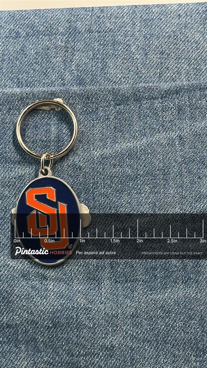 Syracuse University Keychain Orange SU Logo Blue Oval Key Ring NCAA College with ruler overlay for size reference