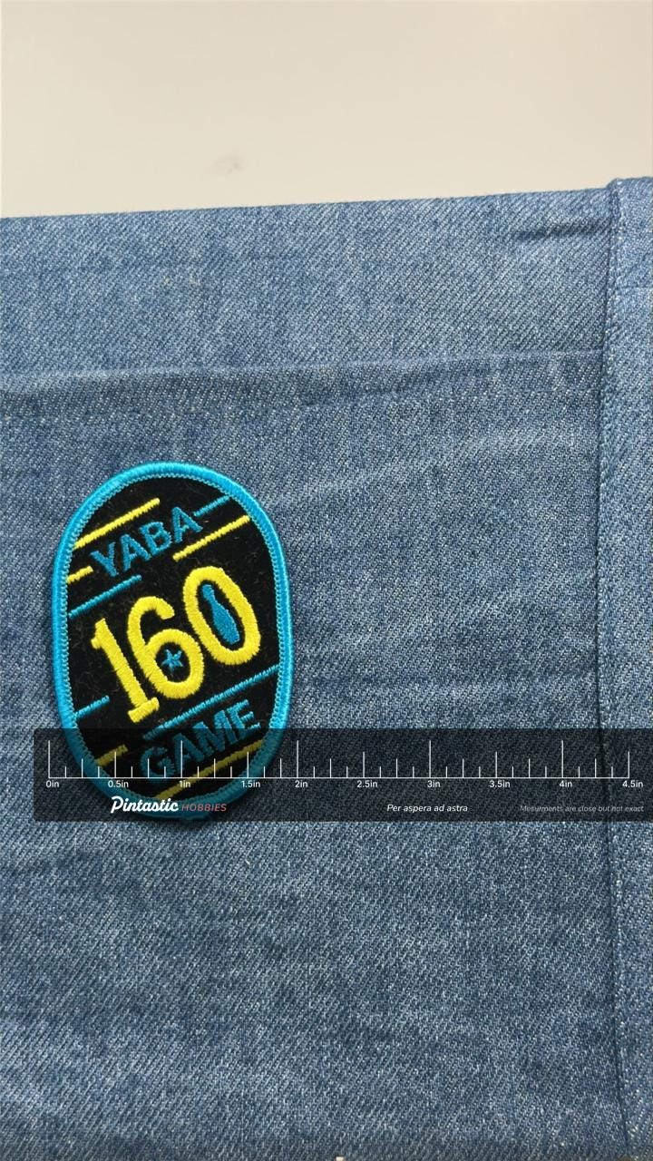YABA 160 Game Patch: Black & Teal Neon - Retro Arcade Accessory with ruler overlay for size reference