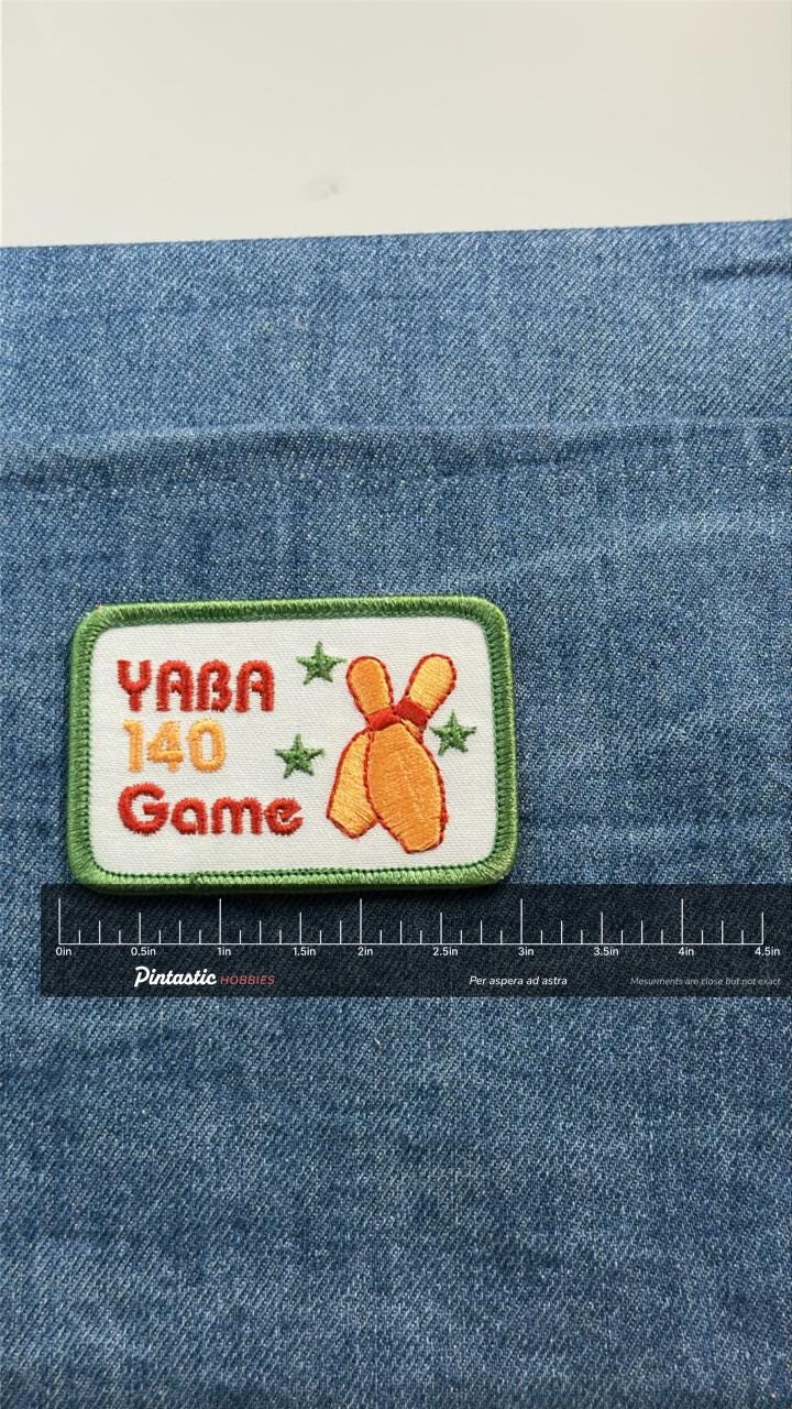 YABA 140 Game Patch: Green Border - Vintage Bowling Award with ruler overlay for size reference