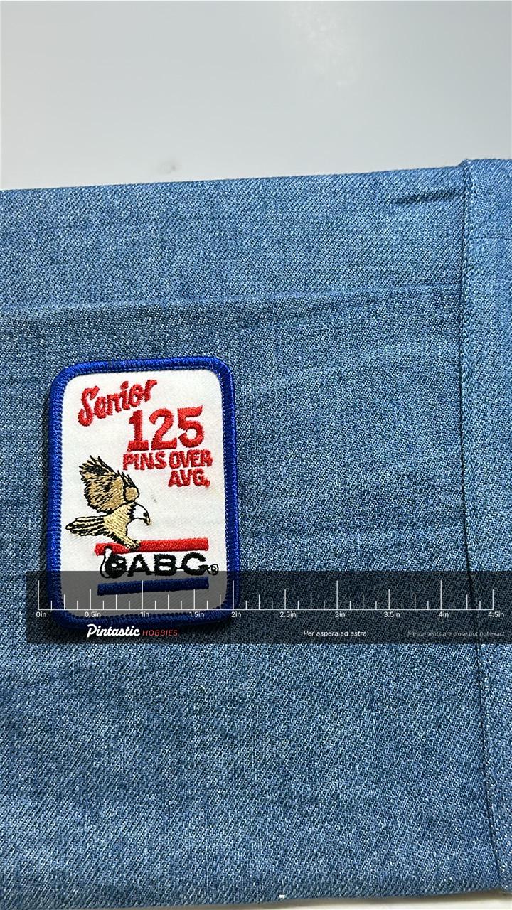 Senior 125 Pins Over Avg Patch: Blue Border - ABC Bowling with ruler overlay for size reference
