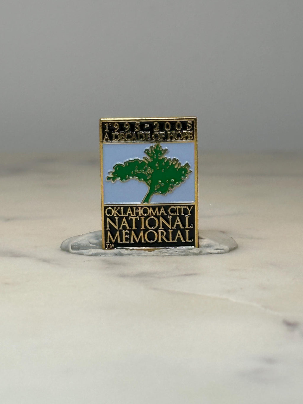 Oklahoma City National Memorial Pin: Gold Tone Enamel - 1995-2005 Tribute Accessory