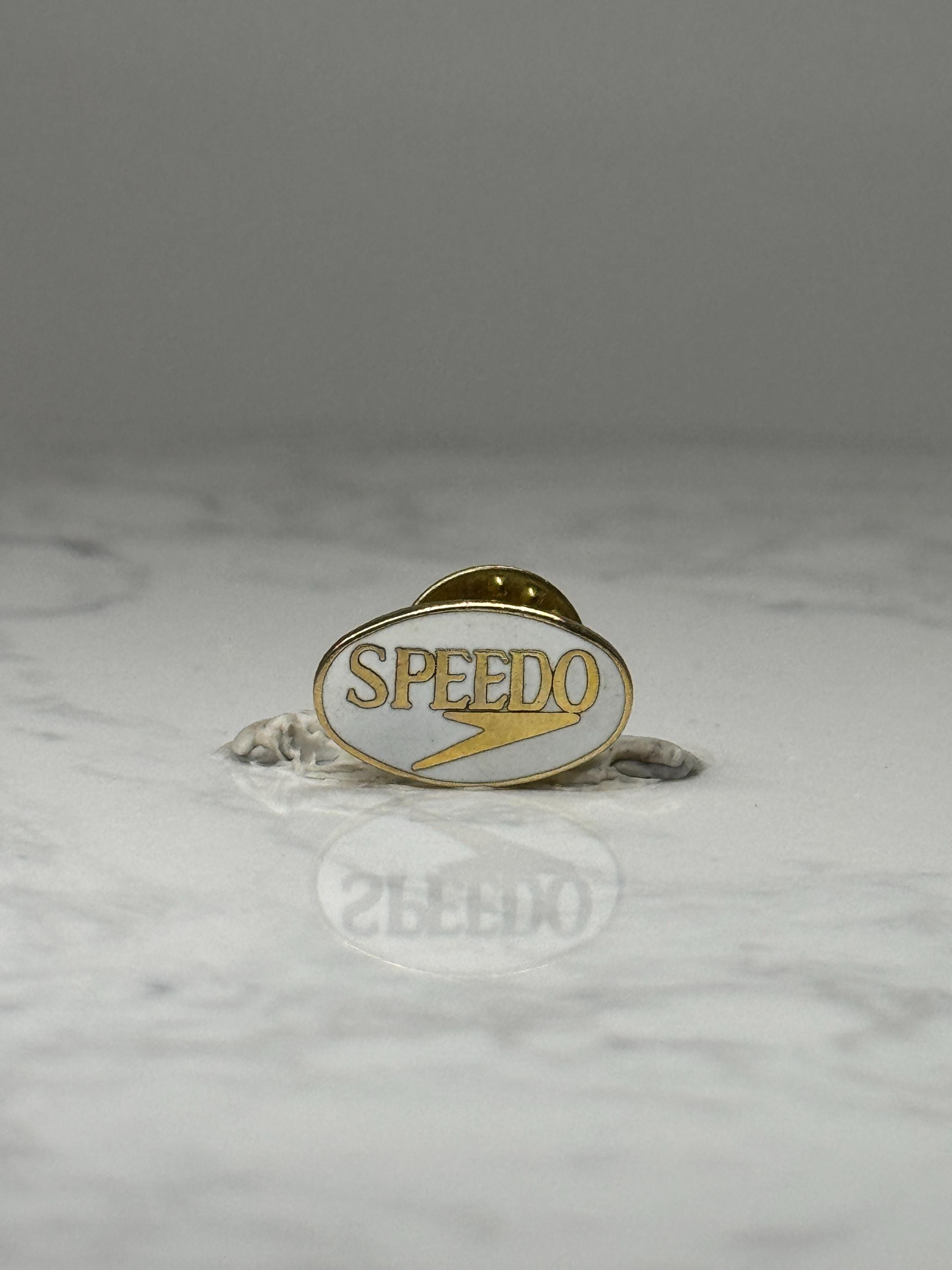 Speedo Logo Lapel Pin: Gold Tone Enamel - Swim Brand Accessory