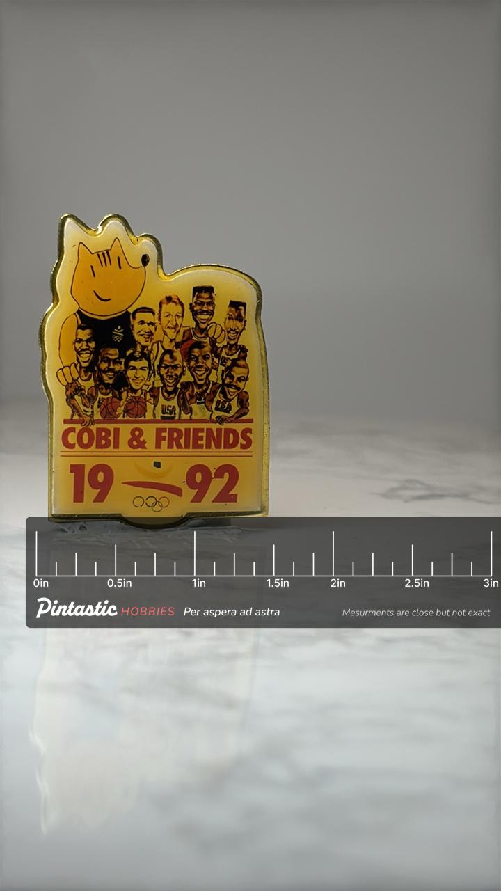 1992 Barcelona Olympics Cobi & Friends Pin: Gold Tone - Sports Souvenir with ruler overlay for size reference