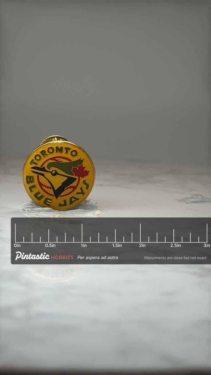 Toronto Blue Jays Baseball Pin: Yellow Enamel - Vintage MLB Accessory with ruler overlay for size reference