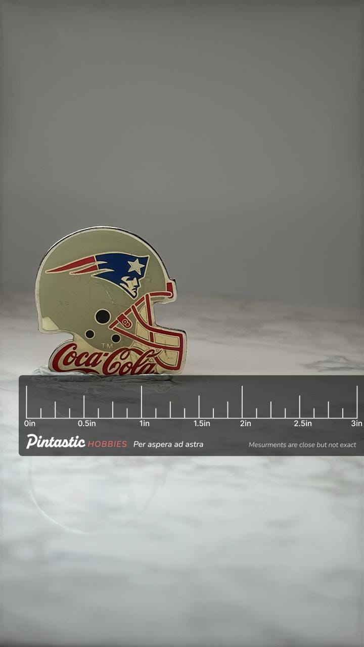 New England Patriots Helmet Pin: Enamel Coca Cola NFL - 1990s Accessory with ruler overlay for size reference