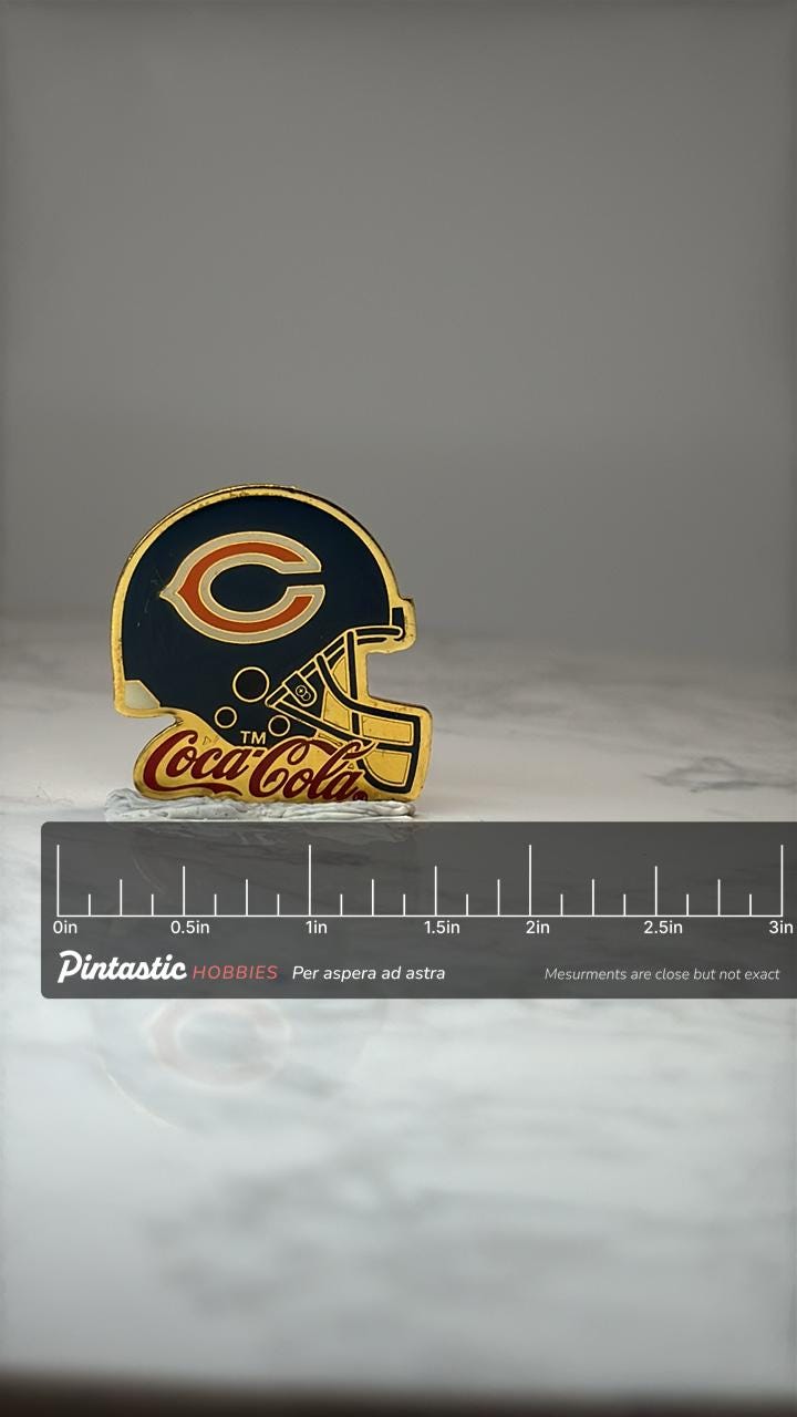 Chicago Bears Helmet Pin: Blue Enamel Gold Tone - NFL Coca Cola with ruler overlay for size reference