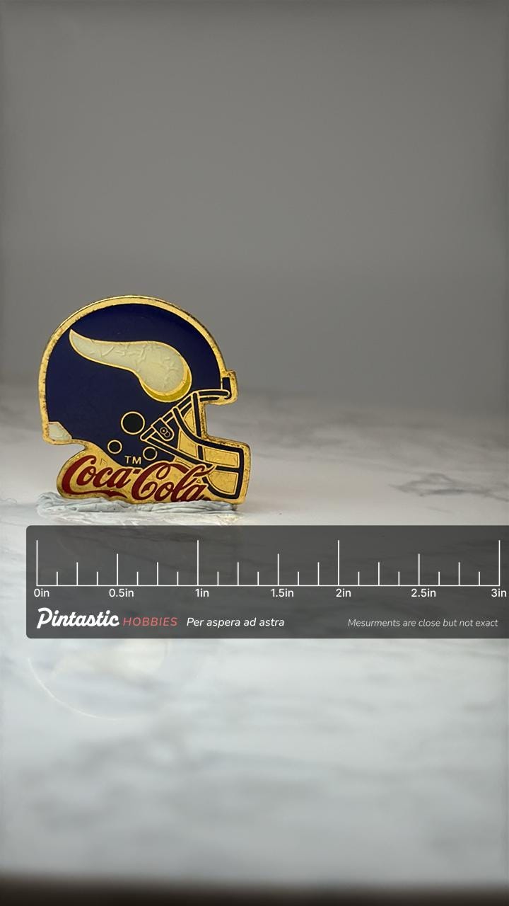 Minnesota Vikings Helmet Pin: Gold Enamel - Coca Cola NFL Promo with ruler overlay for size reference