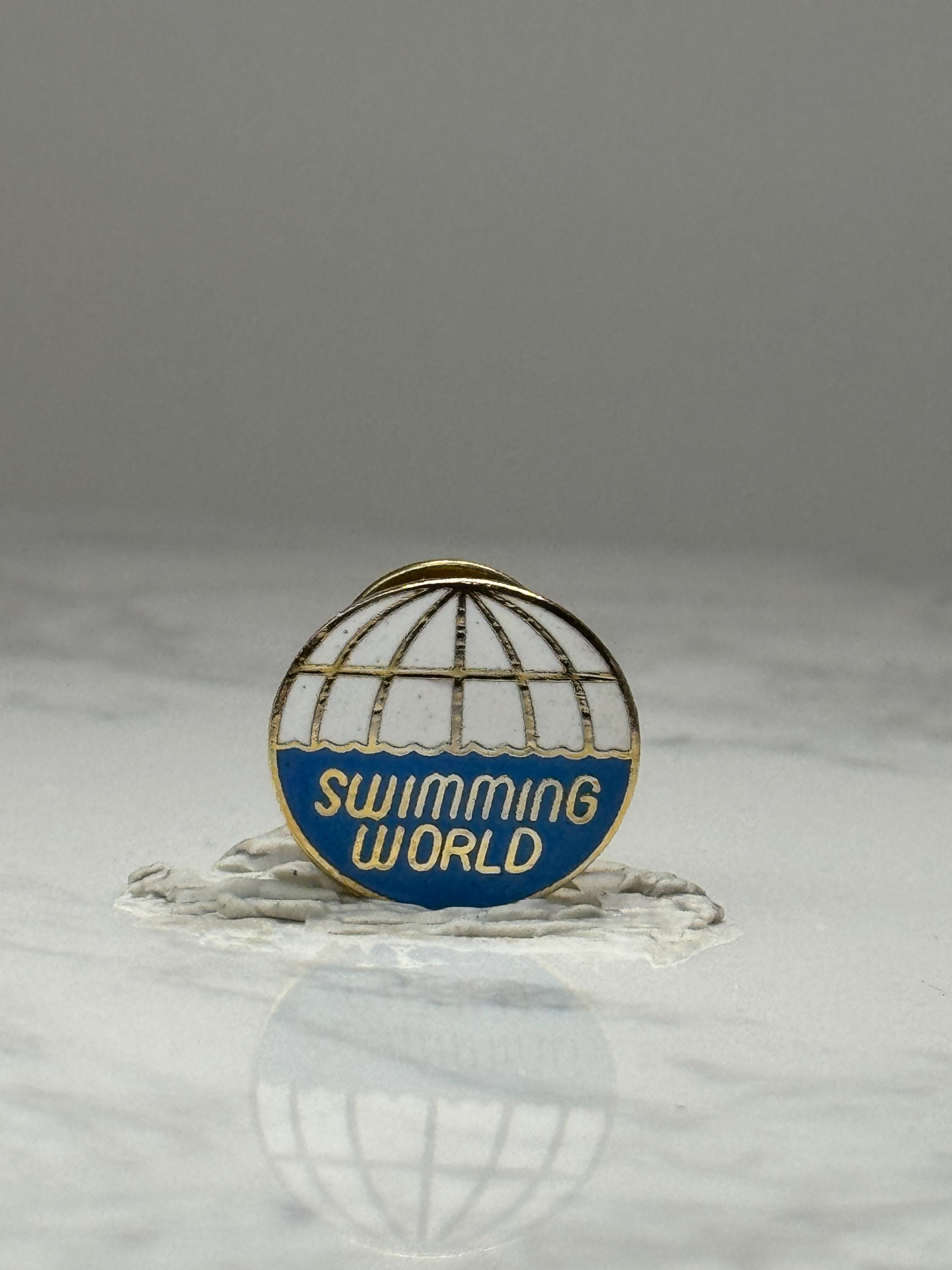 Swimming World Enamel Pin: Blue & Gold Globe - Vintage Sport Accessory