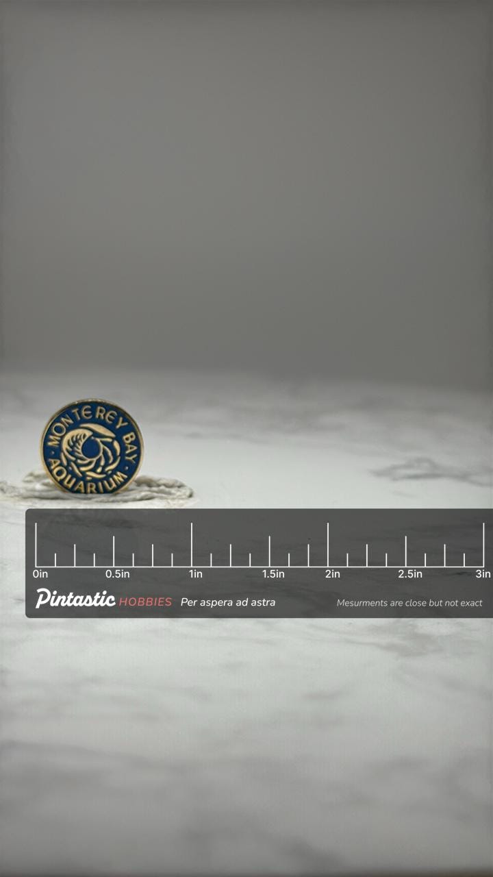 Monterey Bay Aquarium Souvenir Pin: Blue Enamel - Ocean Theme Accessory with ruler overlay for size reference