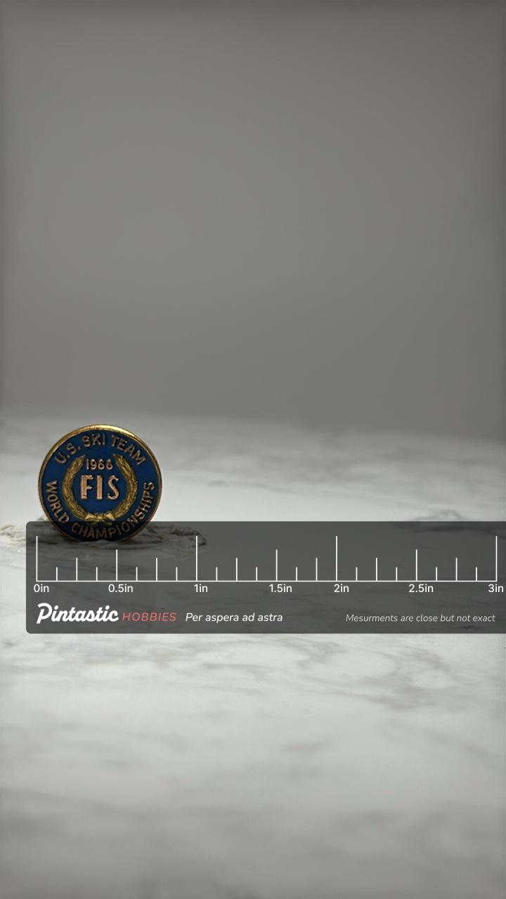 U.S. Ski Team FIS Pin: Blue Gold Enamel - 1966 World Champion with ruler overlay for size reference