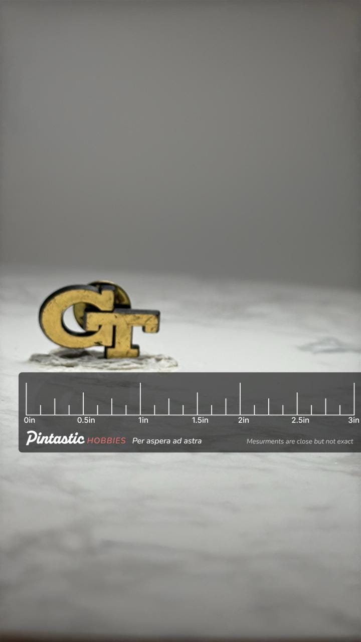 Georgia Tech GT Logo Lapel Pin: Gold Tone Metal - College Accessory with ruler overlay for size reference