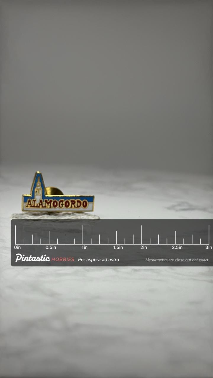 Alamogordo Souvenir Pin: Gold Tone Enamel - New Mexico Travel Accessory with ruler overlay for size reference
